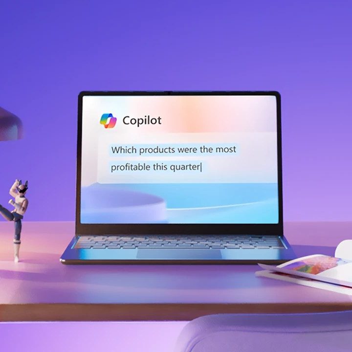 Copilot on a laptop on a desk.