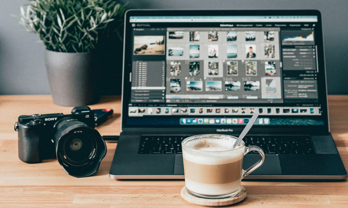An image-editor app being used to edit photos on a laptop.