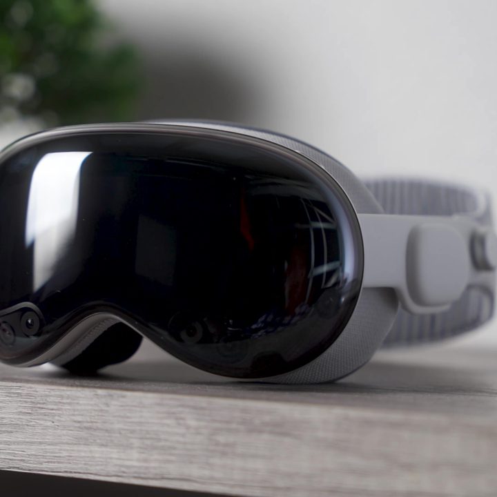 an Apple Vision Pro headset plugged in.
