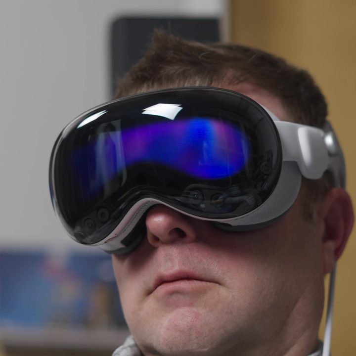 A man wearing an Apple Vision Pro headset.