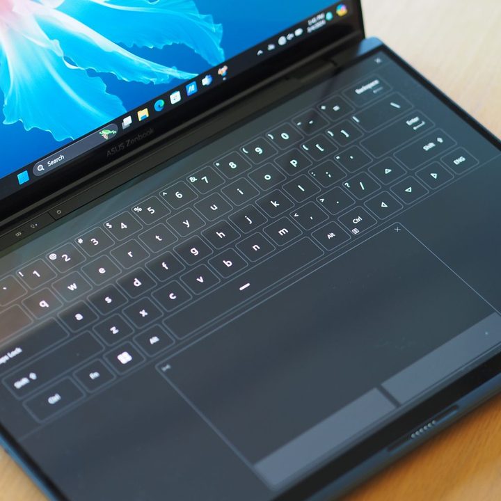 Asus Zenbook DUO 2024 top down view showing software keyboard and touchpad.