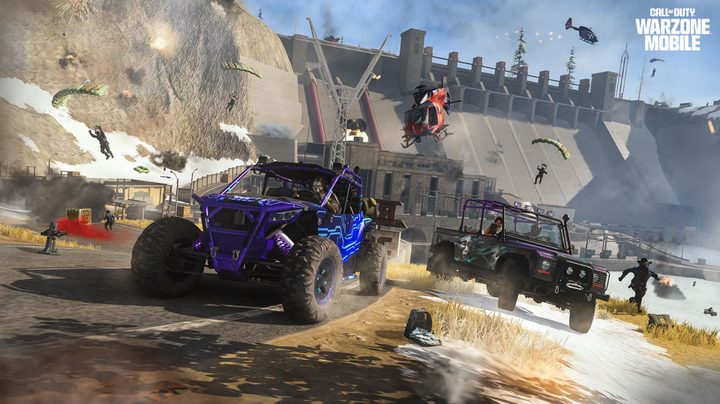Cars drive away from a helicopter in Call of Duty Warzone Mobile.