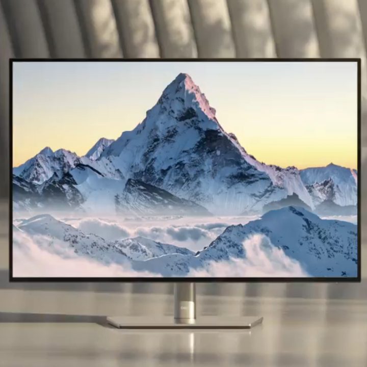 The Dell Ultrasharp 27 4K monitor on a table.