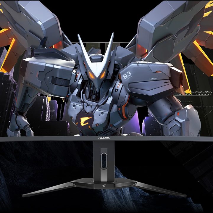 A new Gigabyte Aorus ultrawide monitor with a robotic figure stepping out of it.