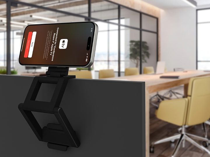 The Belkin iPhone Mount with MagSafe for Apple TV 4K on a television.