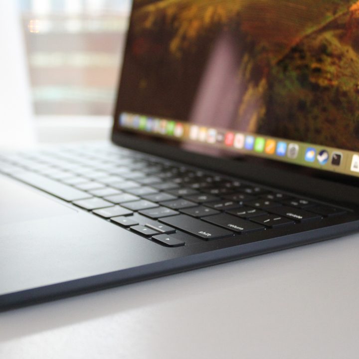 The MacBook Air on a white table.