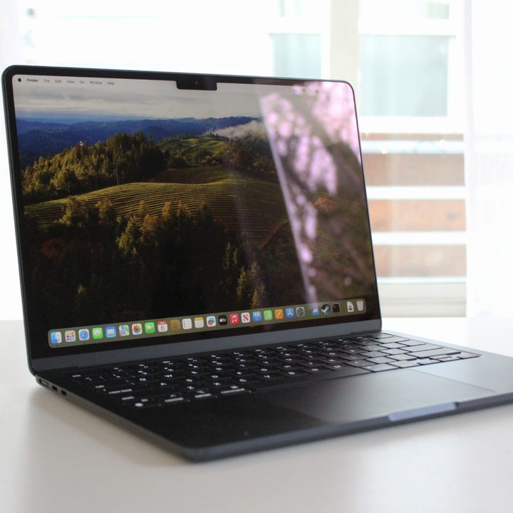 The M3 MacBook Air in front of a window.