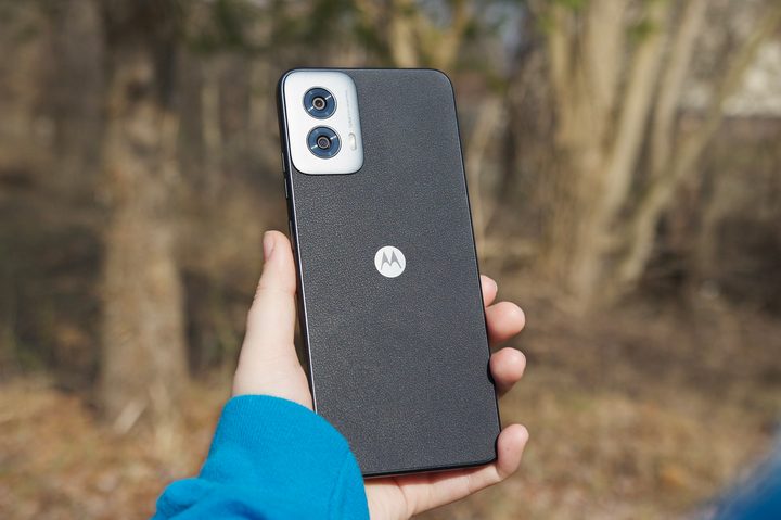 Someone holding the Moto G Power 5G (2024) outside.
