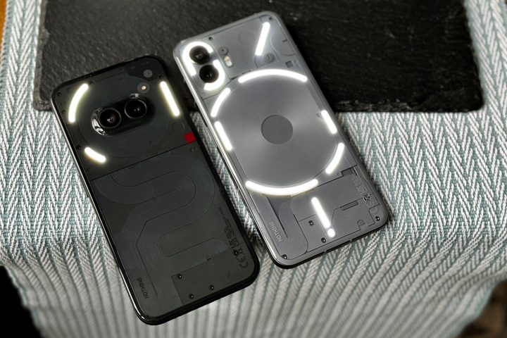 The Nothing Phone 2a and the Nothing Phone 2 with Glyph Lights active.