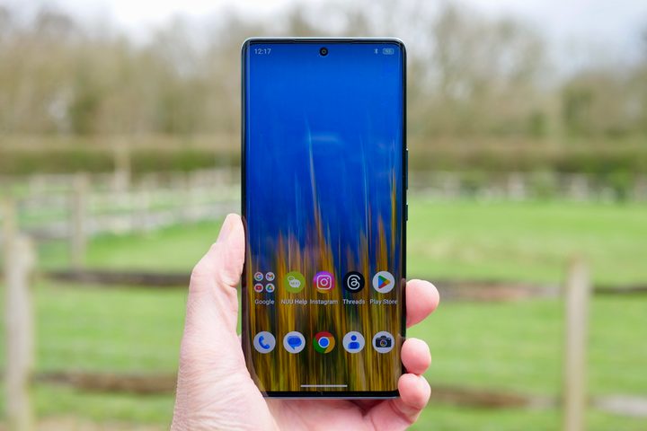 A person holding the Nuu B30 Pro, showing the screen.