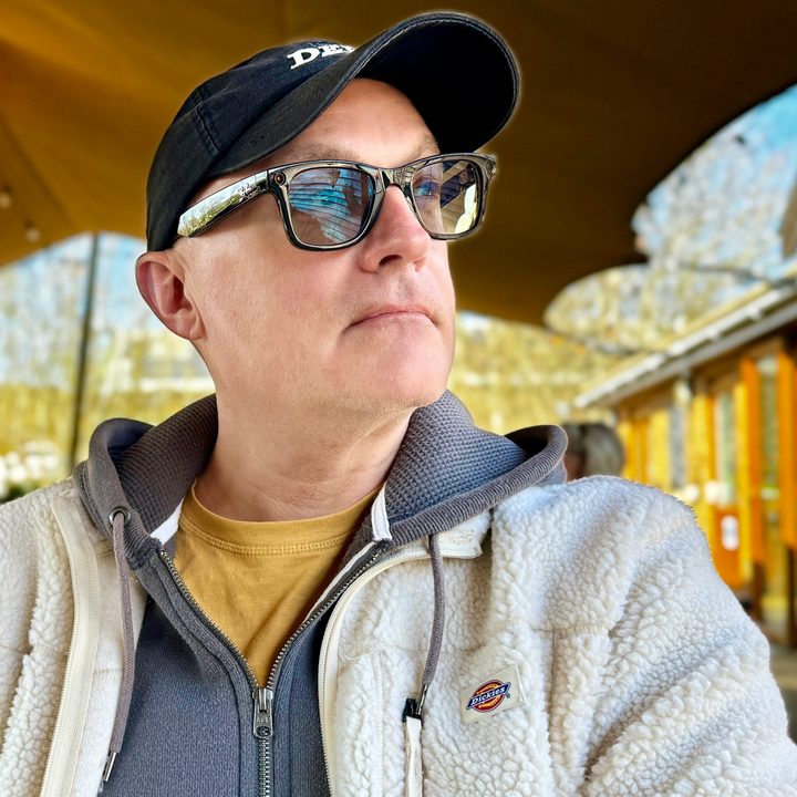 A person wearing the Ray-Ban Meta smartglasses.