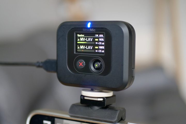 Two microphones connected to the Shure MoveMic receiver.