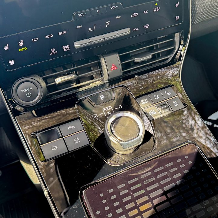 The center console controls of a 2024 Subaru Solterra.