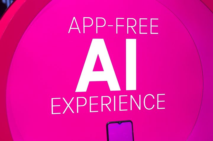 A booth at MWC 2024, showing the T Phone running Brain.ai AI software.