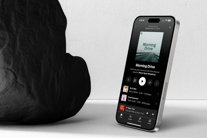 iPhone 15 Pro Max showing the YouTube Music app.