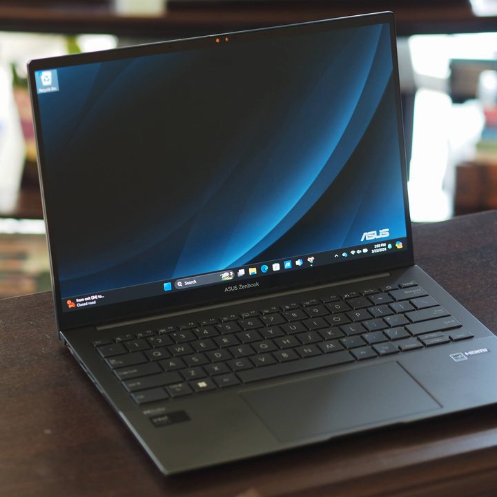 The Zenbook 14Q open on a table.