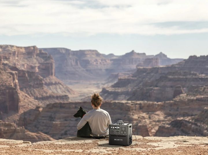 BLUETTI AC240 portable power station used in a canyon, outdoors