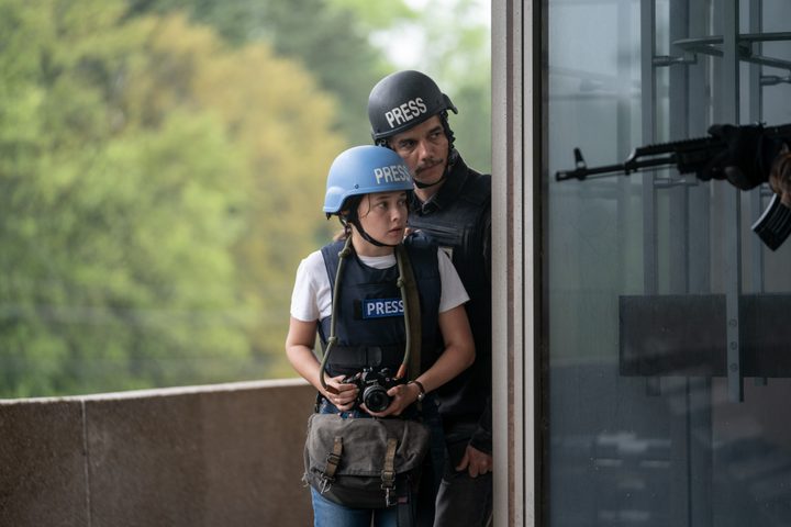 Cailee Spaeny and Wagner Moura wear press helmets in Civil War.