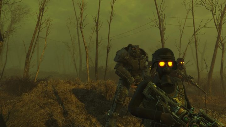 Soldiers under a green sky in fallout 4.