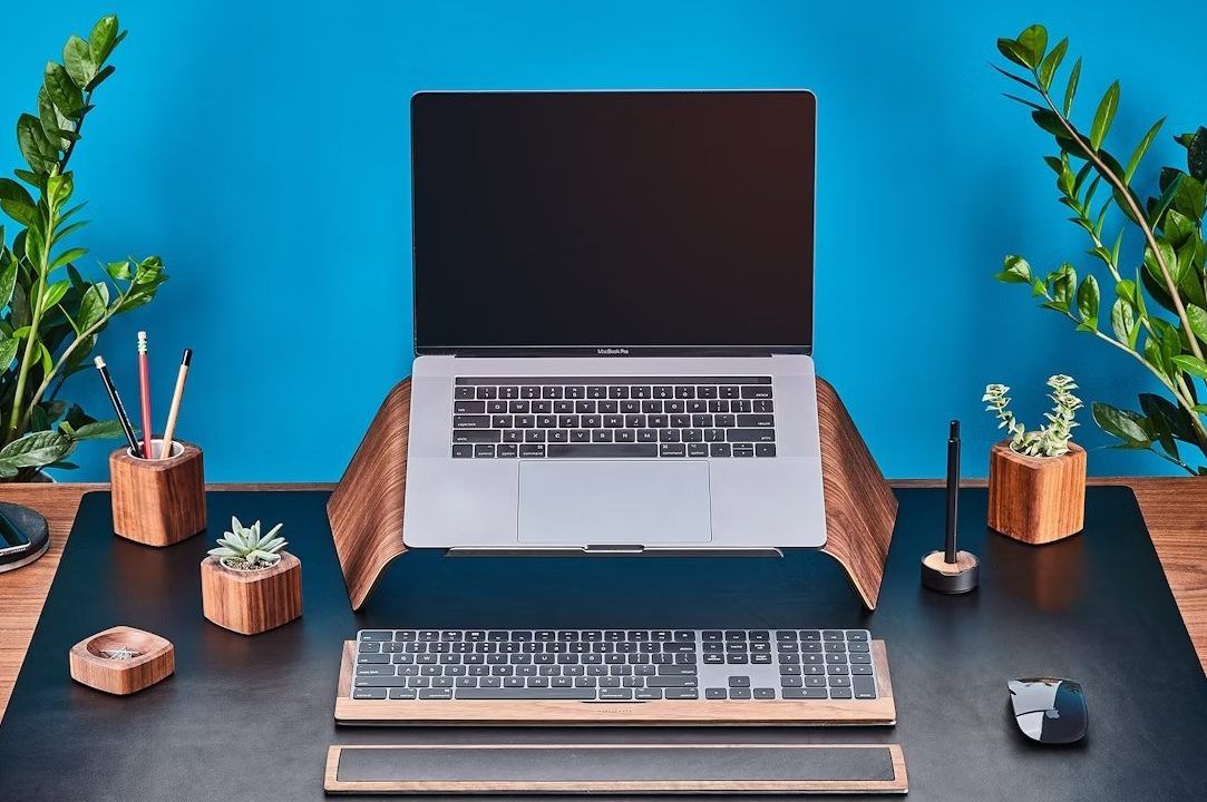 The Grovemade Wood Laptop Stand with other Grovemade desk supplies.