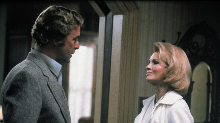 Michael Caine and Angie Dickinson as Robert and Kate talking in Dressed to Kill.