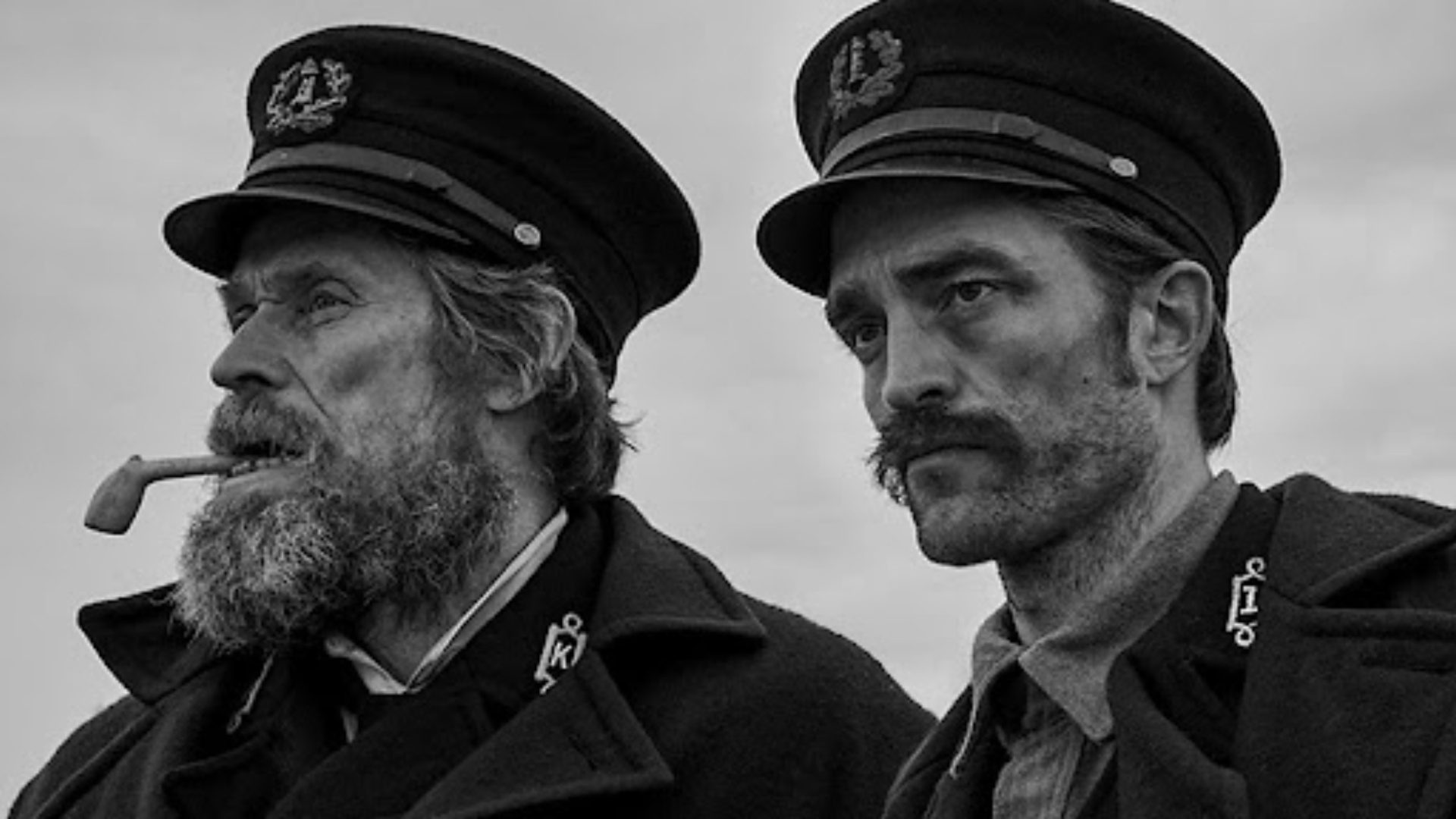 Willem Dafoe and Robert Pattinson as two lighthouse keepers in The Lighthouse.