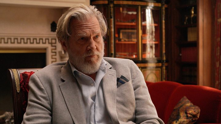 Jeff Bridges sitting in a chair in The Old Man.