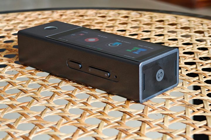 Timekettle X1 AI interpreter translator hub loudspeaker and NFC pad.