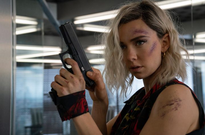 Vanessa Kirby cocks and loada a gun.