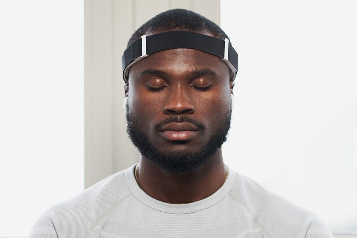 A person wearing the Alphabeats headband.
