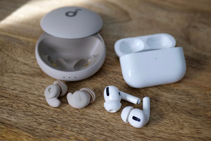 The Anker Soundcore Sleep A20 next to the Apple Airpods