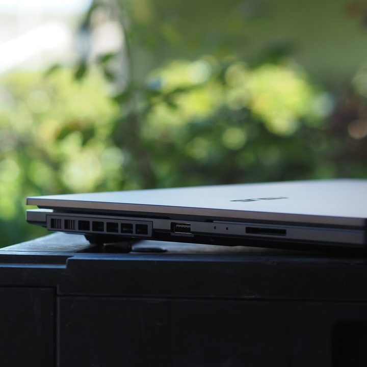 Asus Vivobook Pro 15 OLED Q533 left side showing ports and vents.