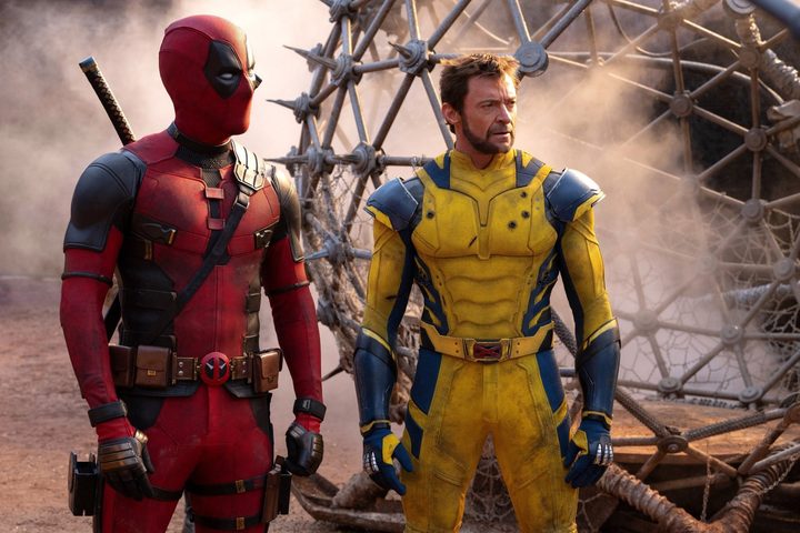 DEadpool and Wolverine stand next to each other in Deadpool & Wolverine.