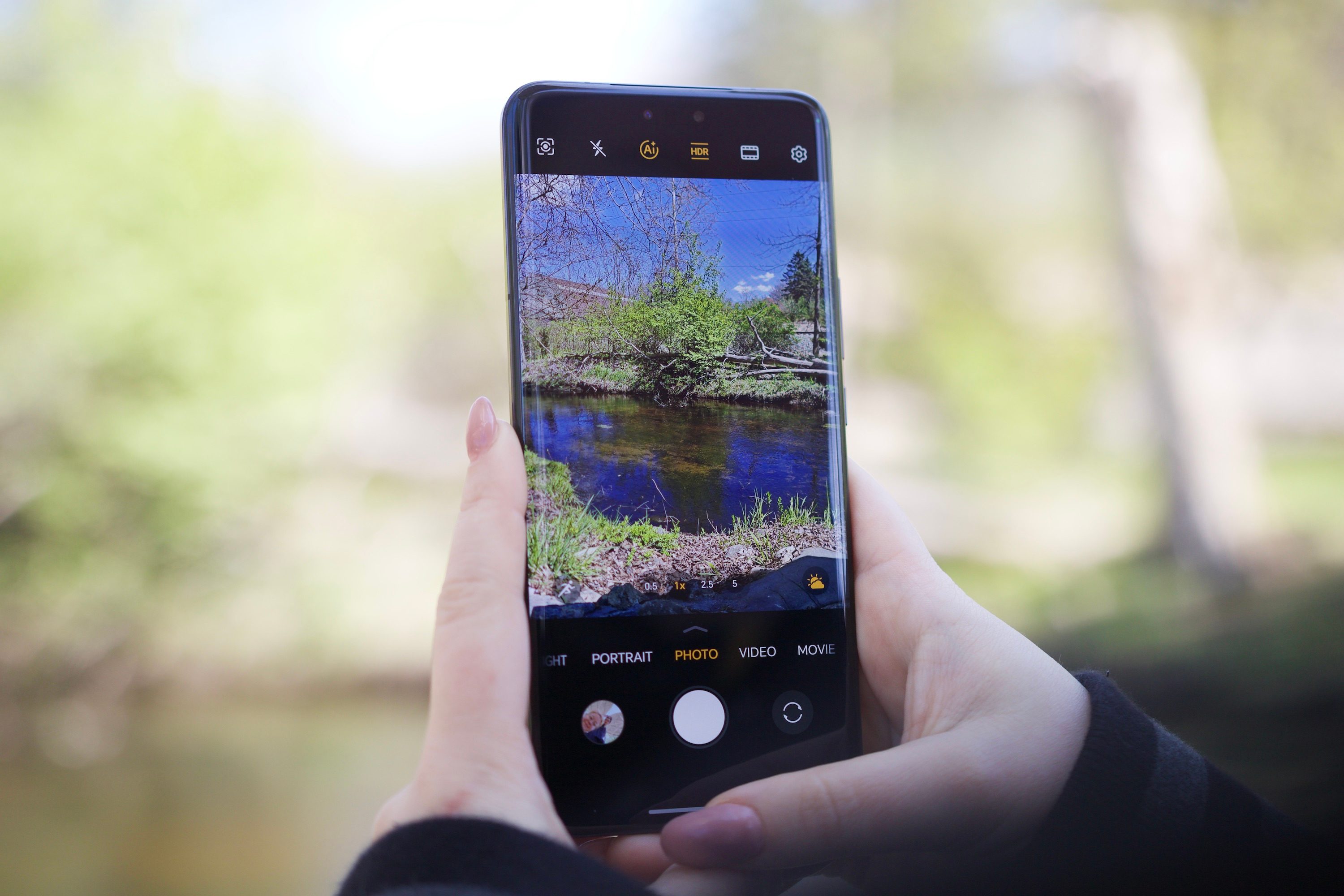 Someone using the camera app on the Honor Magic 6 RSR.