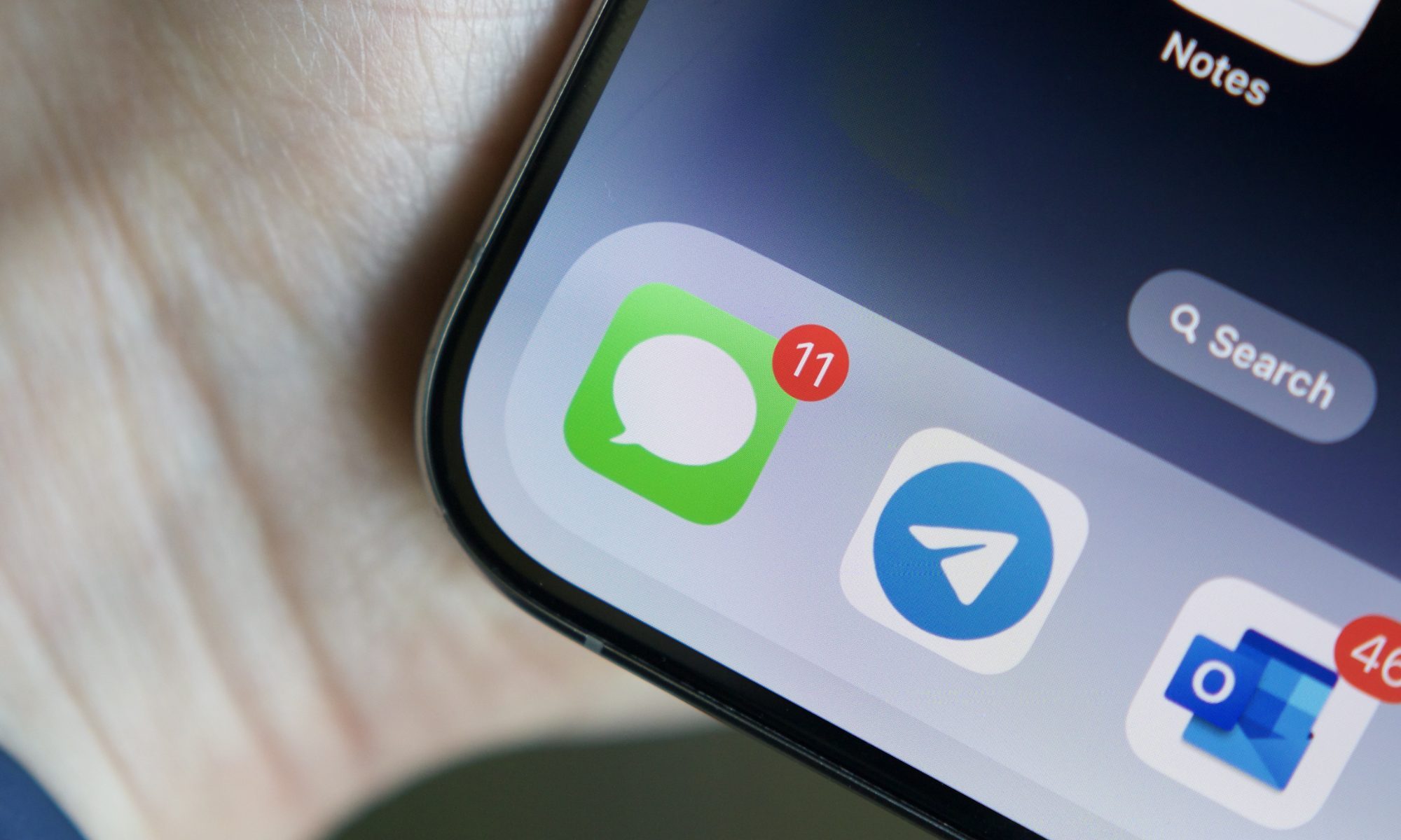 Close-up photo of the Messages app on an iPhone.