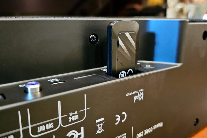 Klipsch Transport 100 wireless dongle inserted into Flexus Core 200 soundbar.