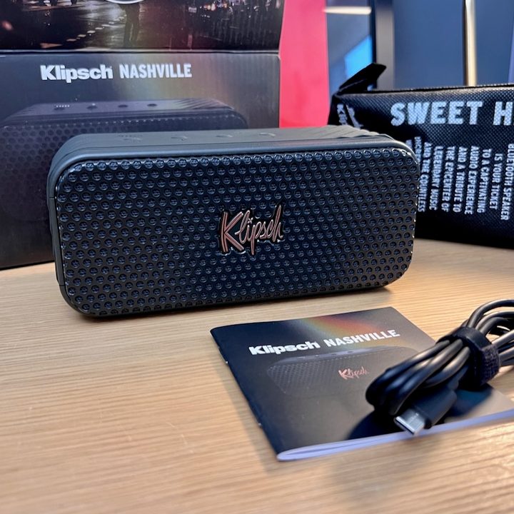 The Klipsch Nashville Bluetooth speaker and its box components on a desk.