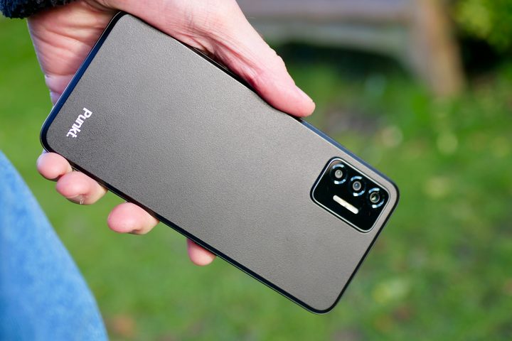 A person holding the Punkt MC02.