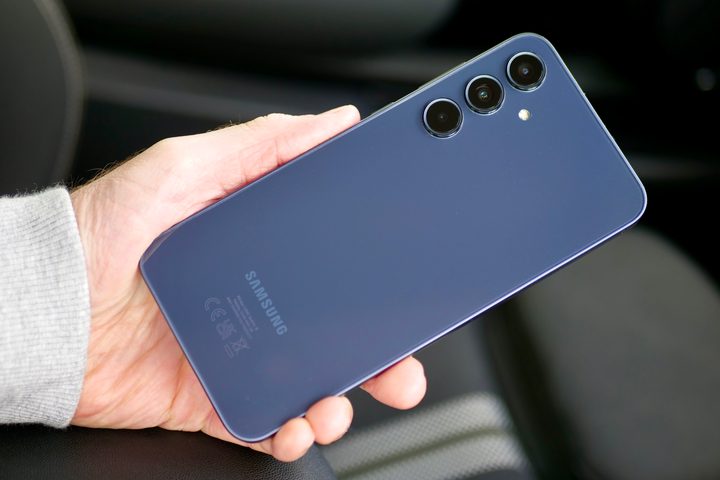 A person holding the Samsung Galaxy A35.