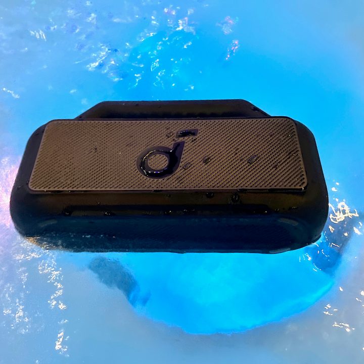 The Soundcore Boom 2 floating in a hot tub.
