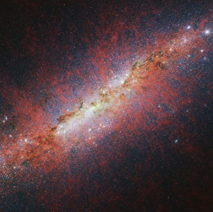 Astronomers used the NASA/ESA/CSA James Webb Space Telescope to look toward M82’s centre, where a galactic wind is being launched as a result of rapid star formation and subsequent supernovae. Studying the galactic wind can offer insight into how the loss of gas shapes the future growth of the galaxy.This image from Webb’s NIRCam (Near-Infrared Camera) instrument shows M82’s galactic wind via emission from sooty chemical molecules known as polycyclic aromatic hydrocarbons (PAHs). PAHs are very small dust grains that survive in cooler temperatures but are destroyed in hot conditions. The structure of the emission resembles that of hot, ionised gas, suggesting PAHs may be replenished by continued ionisation of molecular gas.