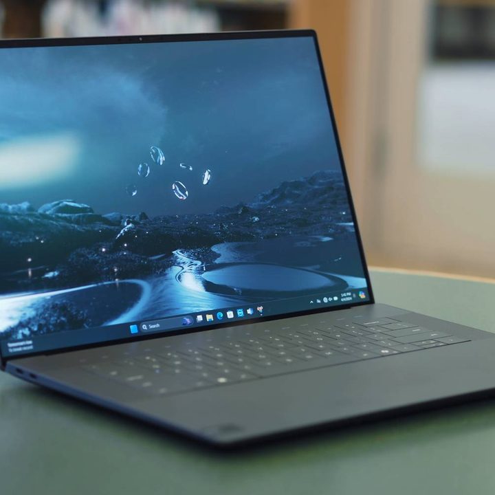The XPS 16 open on a table.