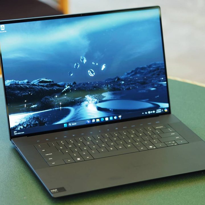The XPS 16 open on a table.