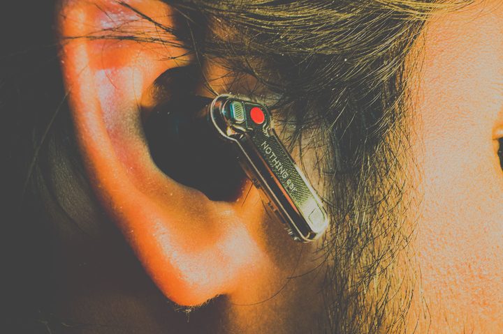 Person wearing Nothing Ear earbuds
