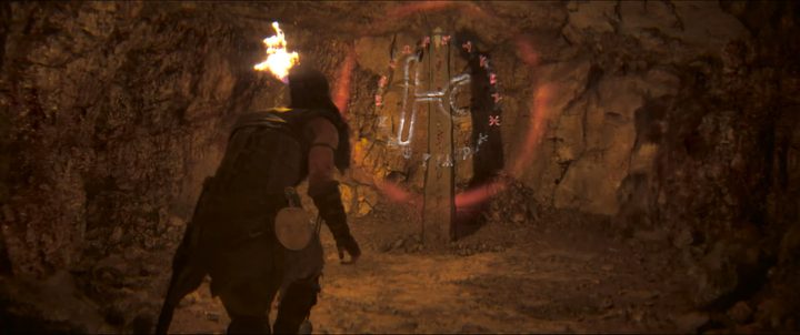 Senua approaching a lore totem in Hellblade 2.
