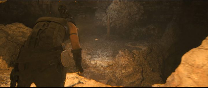 Senua approaching a lore totem in Hellblade 2.