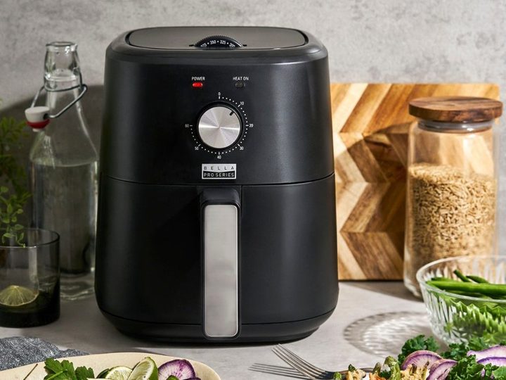 The Bella Pro Series 3 Quart Air Fryer near food.