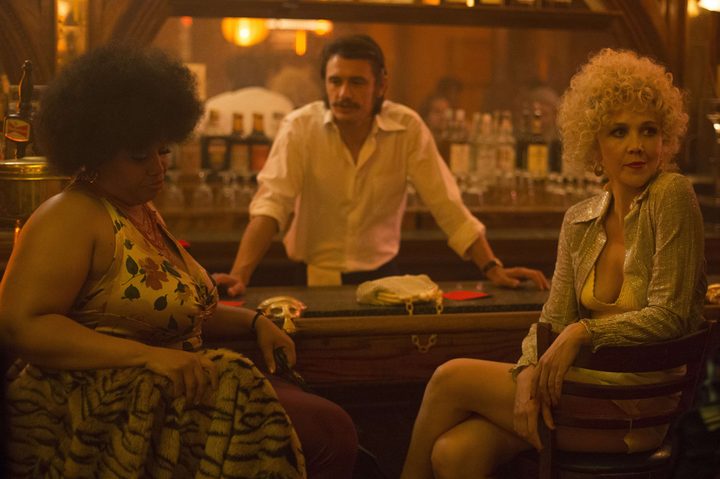 Candy sits at a bar in The Deuce.