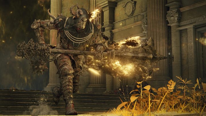 A knight with a glowing yellow axe in Elden Ring.