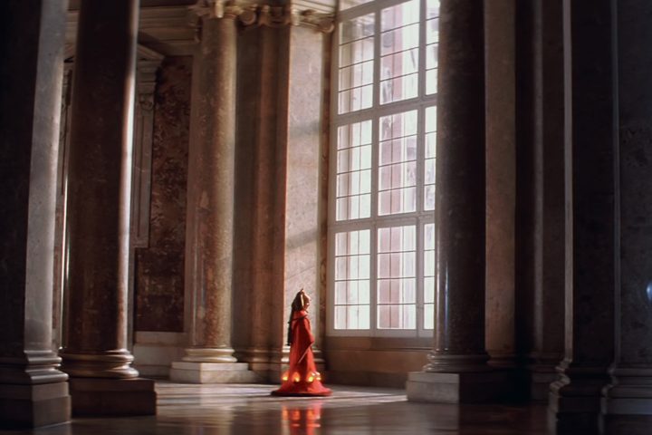 Padme stands in front of a window in Star Wars: Episode I - The Phantom Menace.